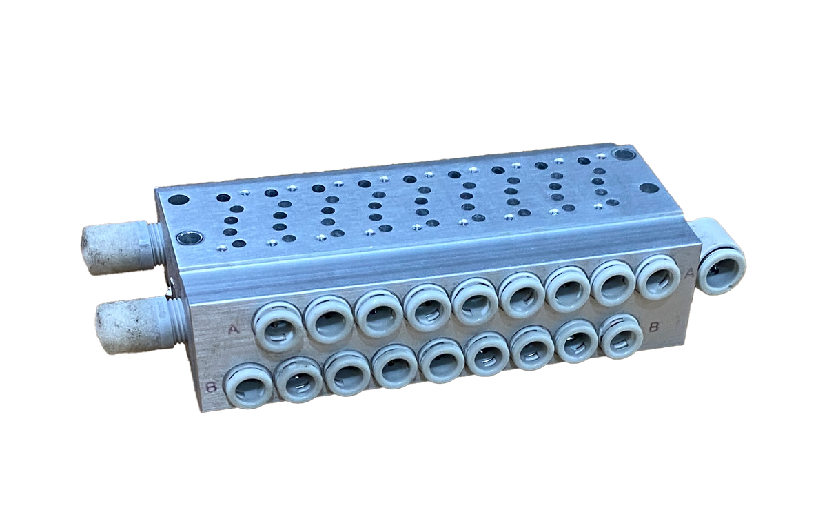 SMC SY 3000 Manifold for 9 solenoids + 18 one touch fittings (6mm) + 2 air mufflers
